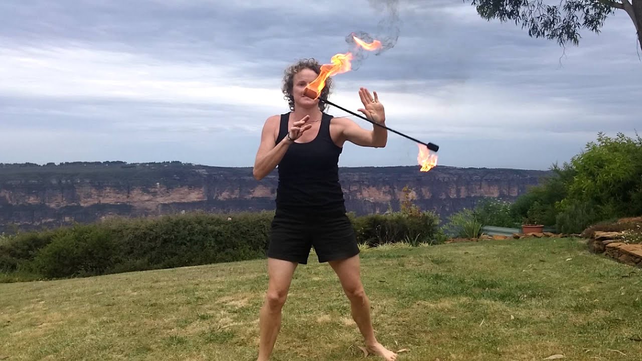 Fire Long string Leviwand/Flow wand in the Blue Mountains, Australia