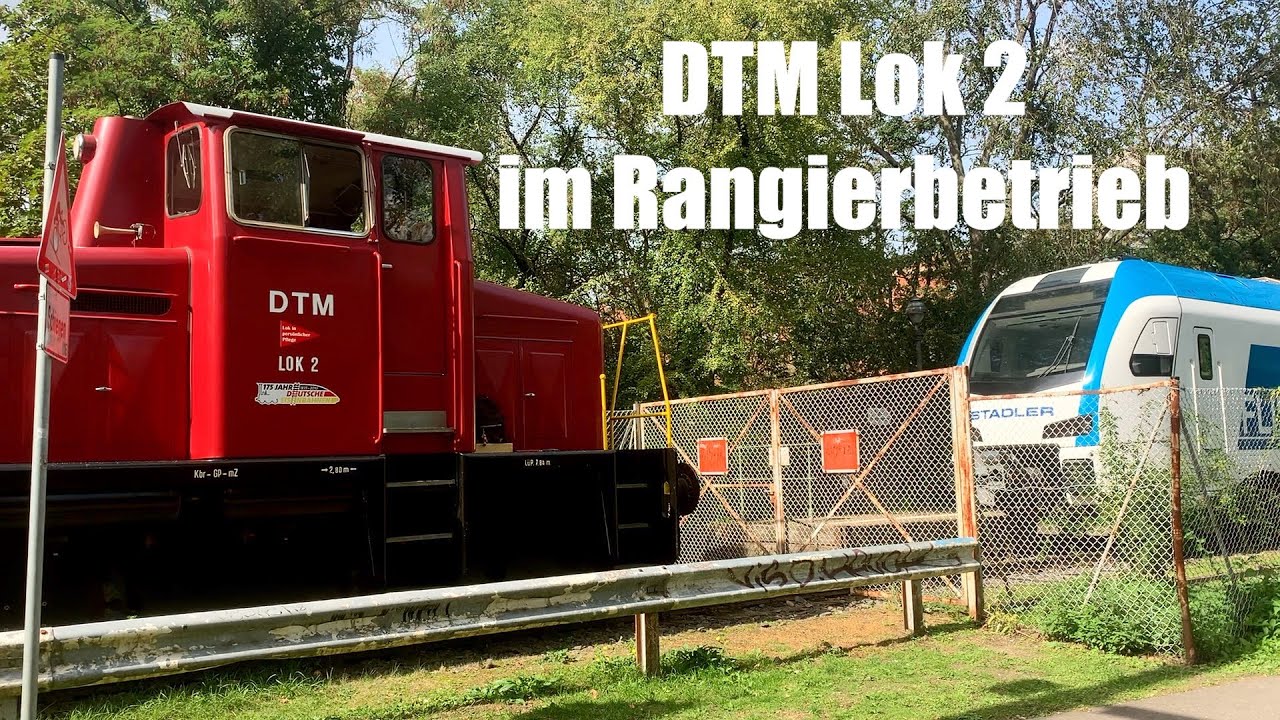 DTM Lok 2 von O&K im Rangierbetrieb - Zwischen dem Flirt von Stadler und einem alten S-Bahnwagen