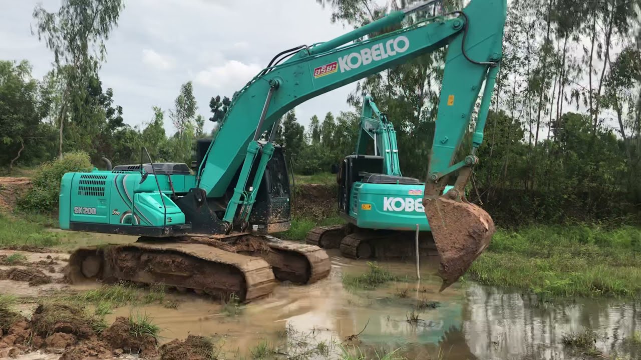 เจ้า KOBELCO SK200 Sm-10 มาเจอหน้างานมีน้ำแบบนี้ จะลงได้ไหมลูกพี่?