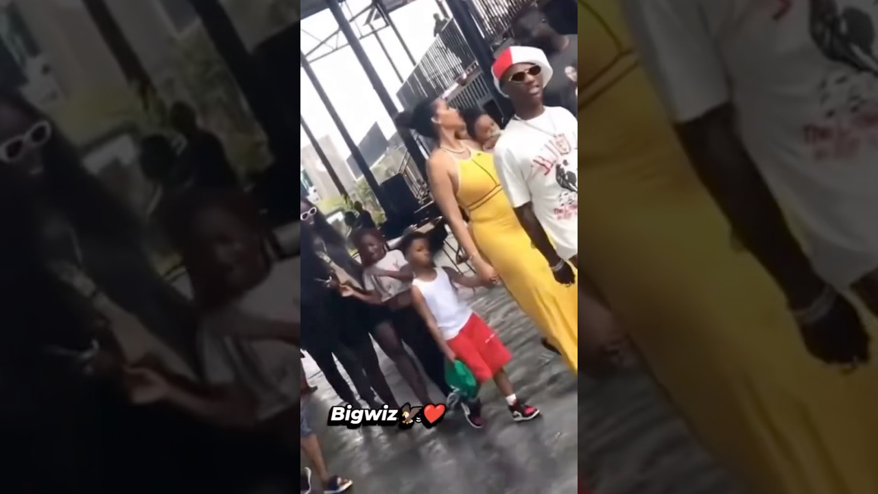 Wizkid with his mother of his children Jada p and his kids walking on the street