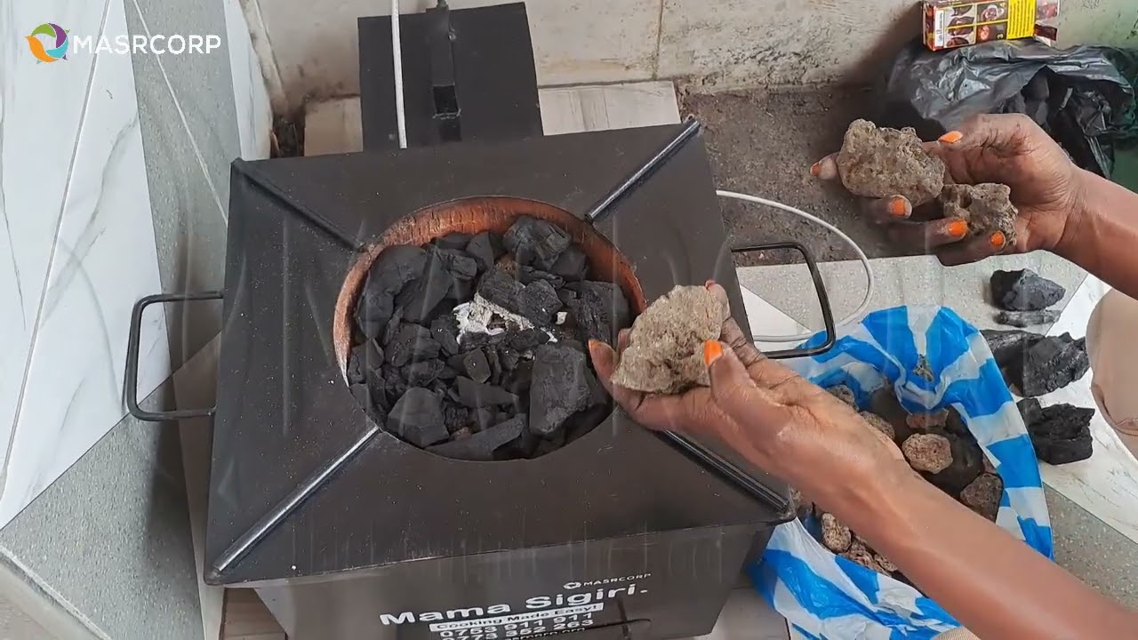 Lighting up a Masrcorp solar Aided Mama Stove.