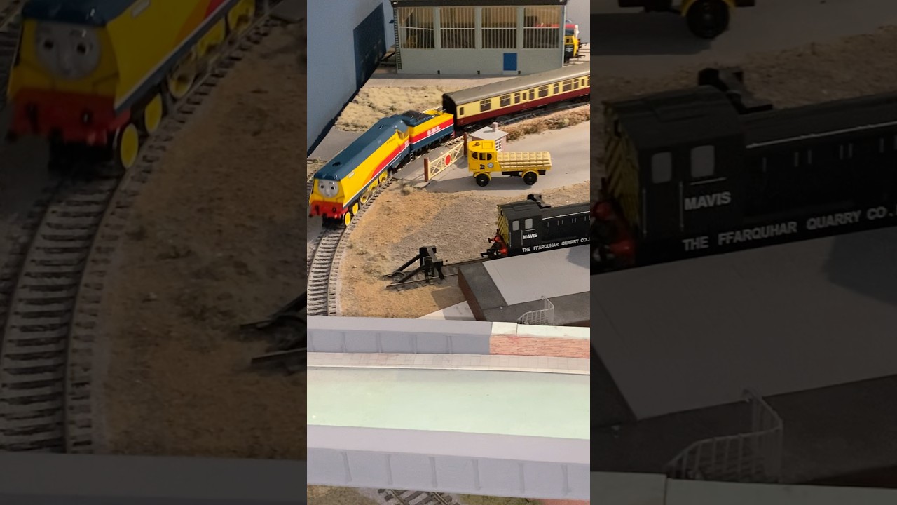 Rebecca goes through the level crossing with the BR MK1 coaches