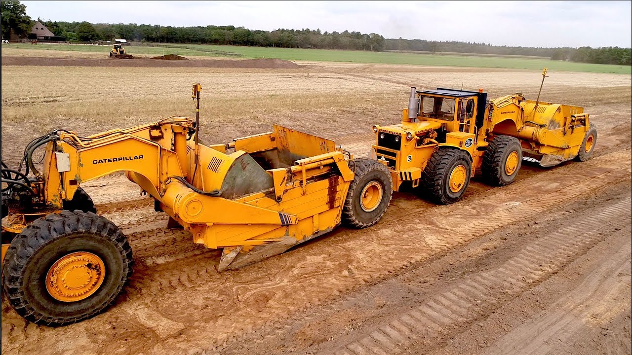 Classic Earthmovers | 2x Caterpillar 830 MB Scraper Tractor [ex US Army] Field Leveling