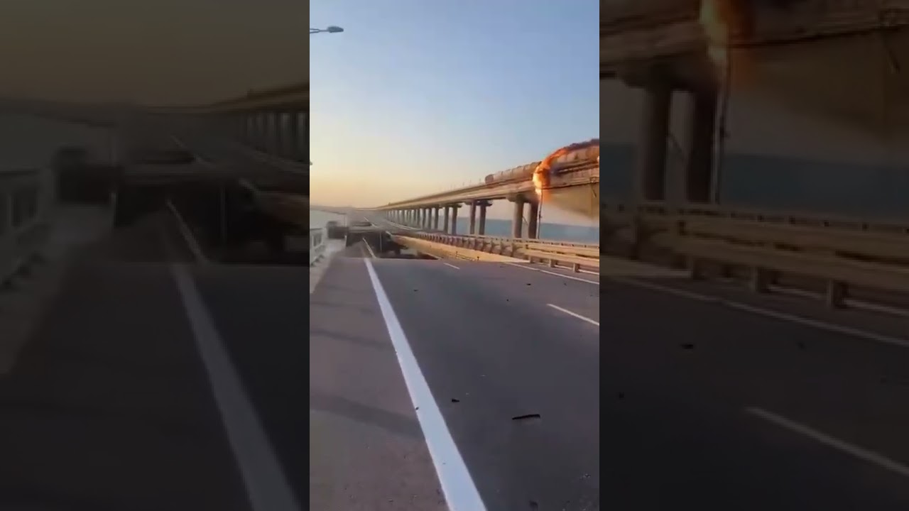 a burning train on the Crimean bridge and a collapsed bridge