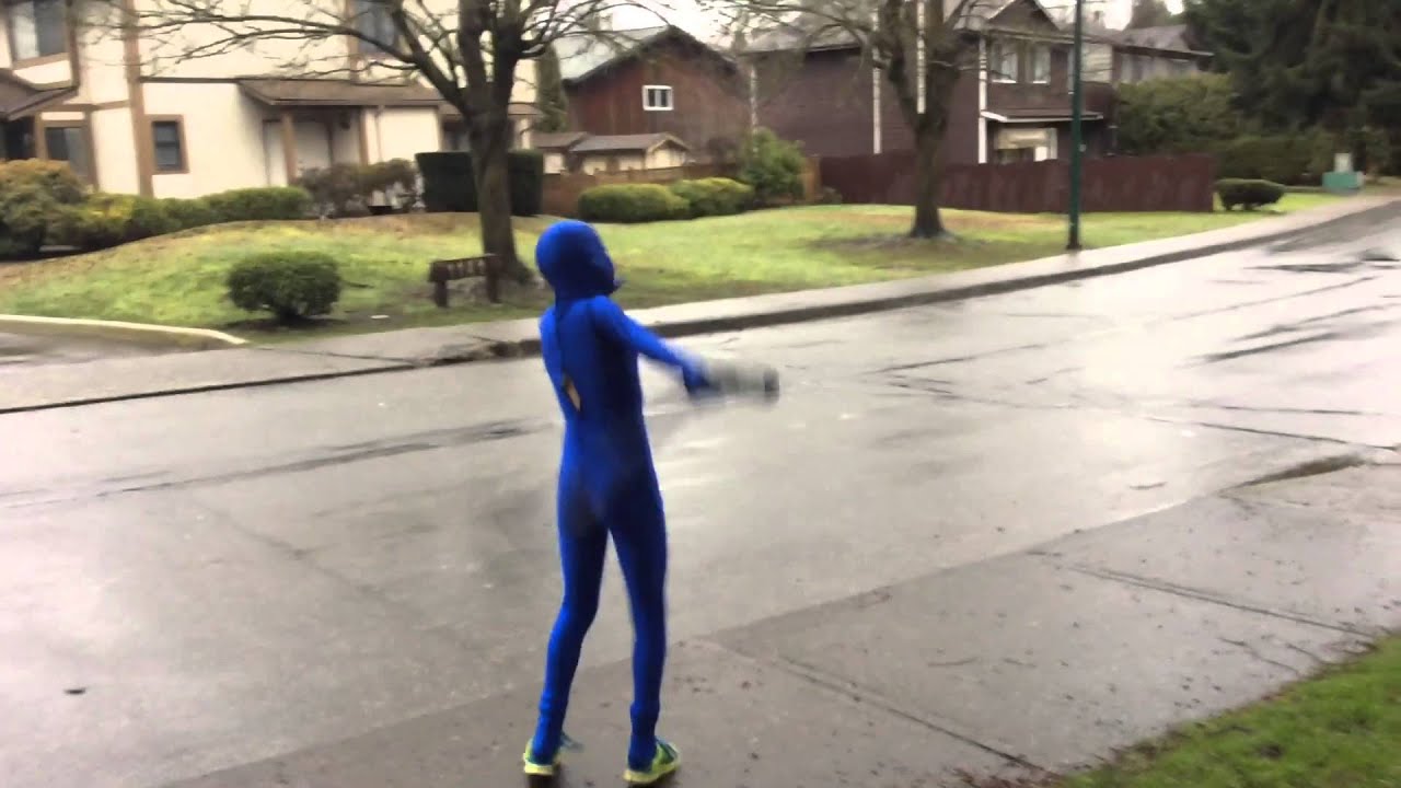 Crazy blue guy dancing in the streets