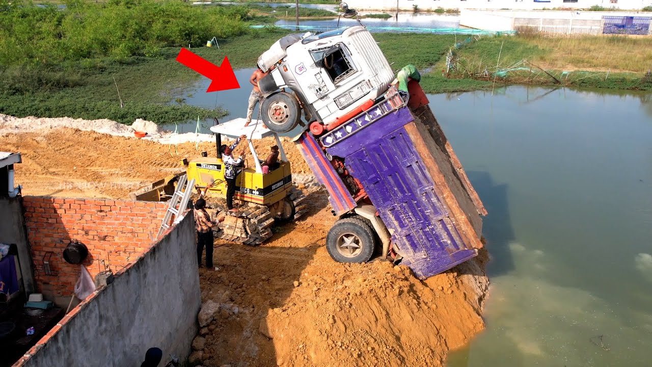 OMG!! Mini 5ton Dump Truck Get interrible Accident While Unloading Soil Filling into The Deep Pond
