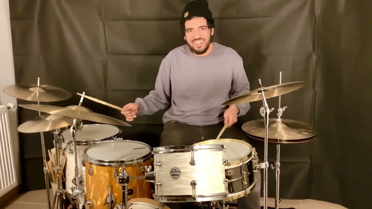 Matheus Jardim checking some new cymbals
