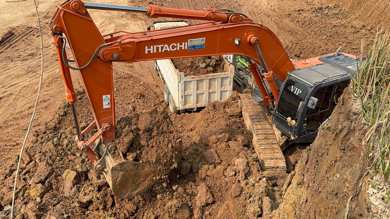 Extreme Lake Bottom Excavation! Hitachi Zaxis 350 Mastering Steep Terrain with 41 Ton Dump Trucks!