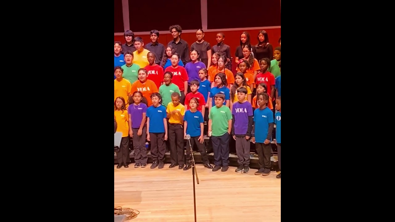 Perry Hayes directs YOLA Choir Concert
