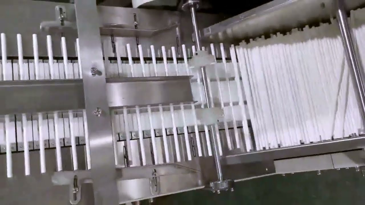 Drinking straw packaging machine with automated lifting feeder