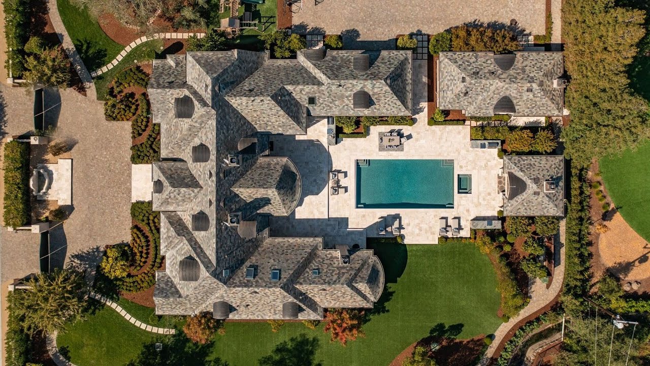 $16,495,000! This exquisite country French home in Atherton offers a perfect resort style living