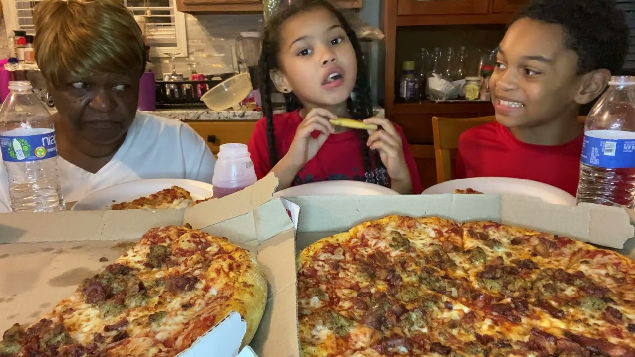 Pizza from Domminos Pizza tonight with drinks I was drinking water. The kids were drinking juices.
