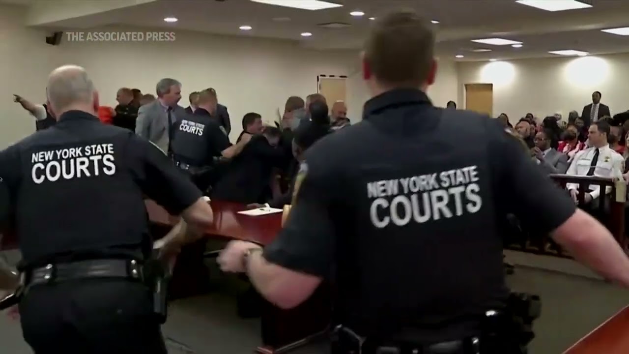 Man rushes Buffalo shooter in court