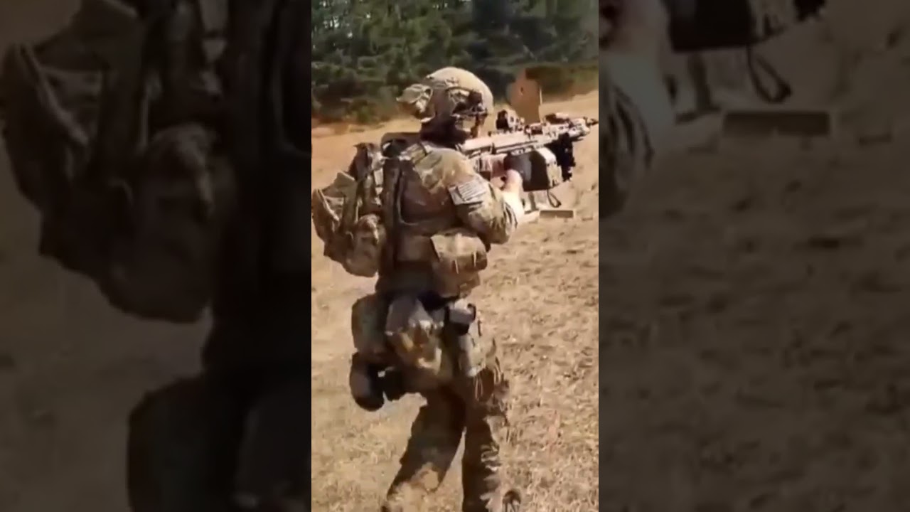 Soldiers of the 75th Ranger Regiment ignore the recoil of  KAC LAMG light machine gun.