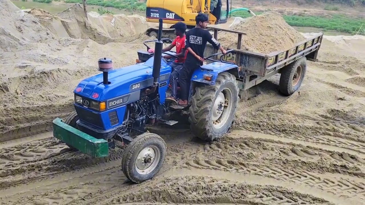 All My Tractors Arrived Together In The Field, Loaded By A Backhoe Machine, Then Left With The Load