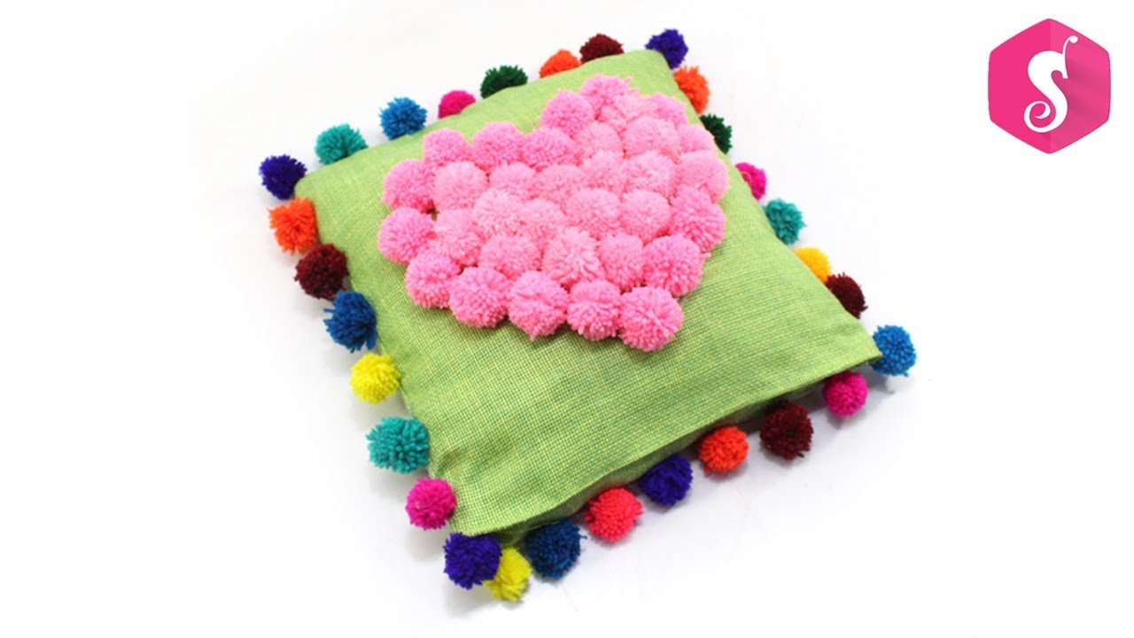DIY POM POM SOFA PILLOW from WOOLEN