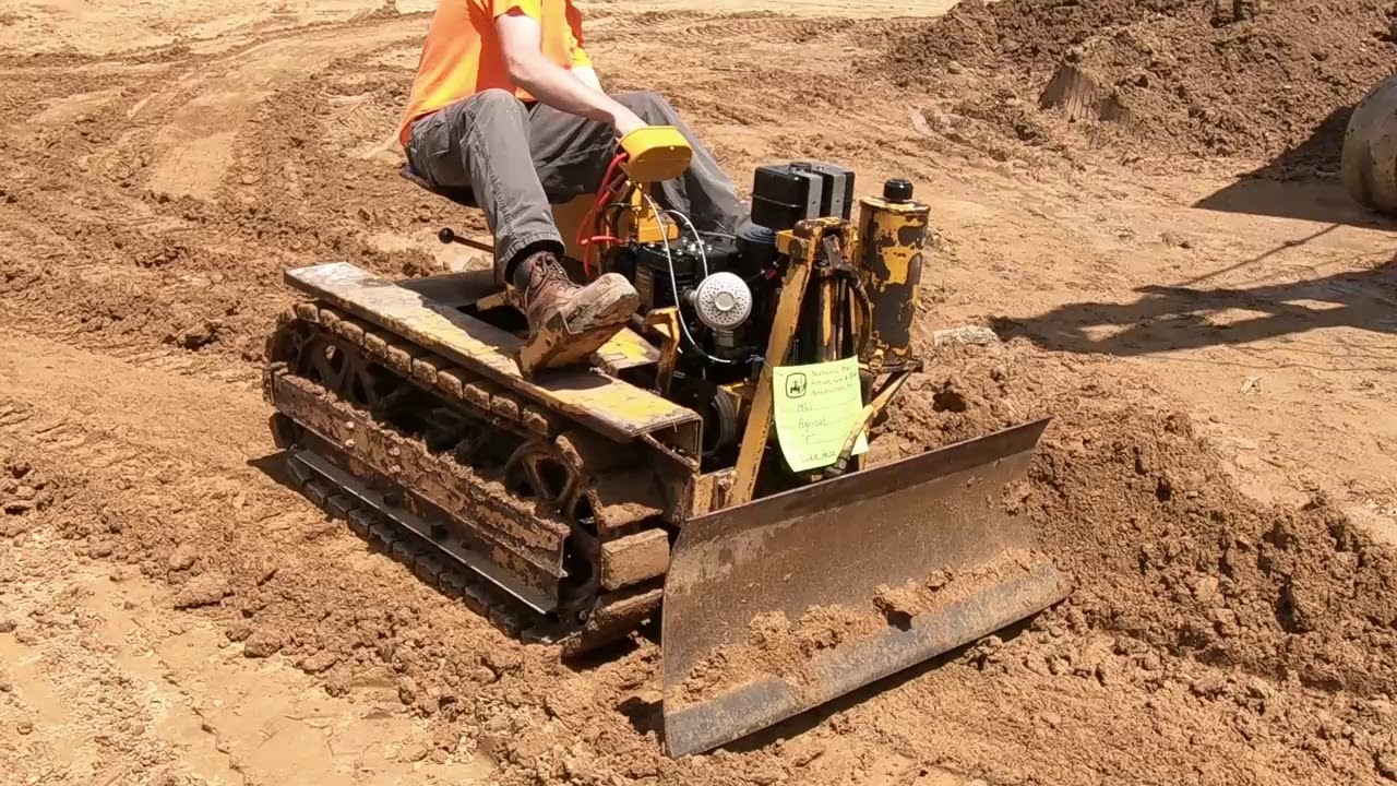 Agricat Mini Dozer Pushing Dirt At National Pike Steam Show