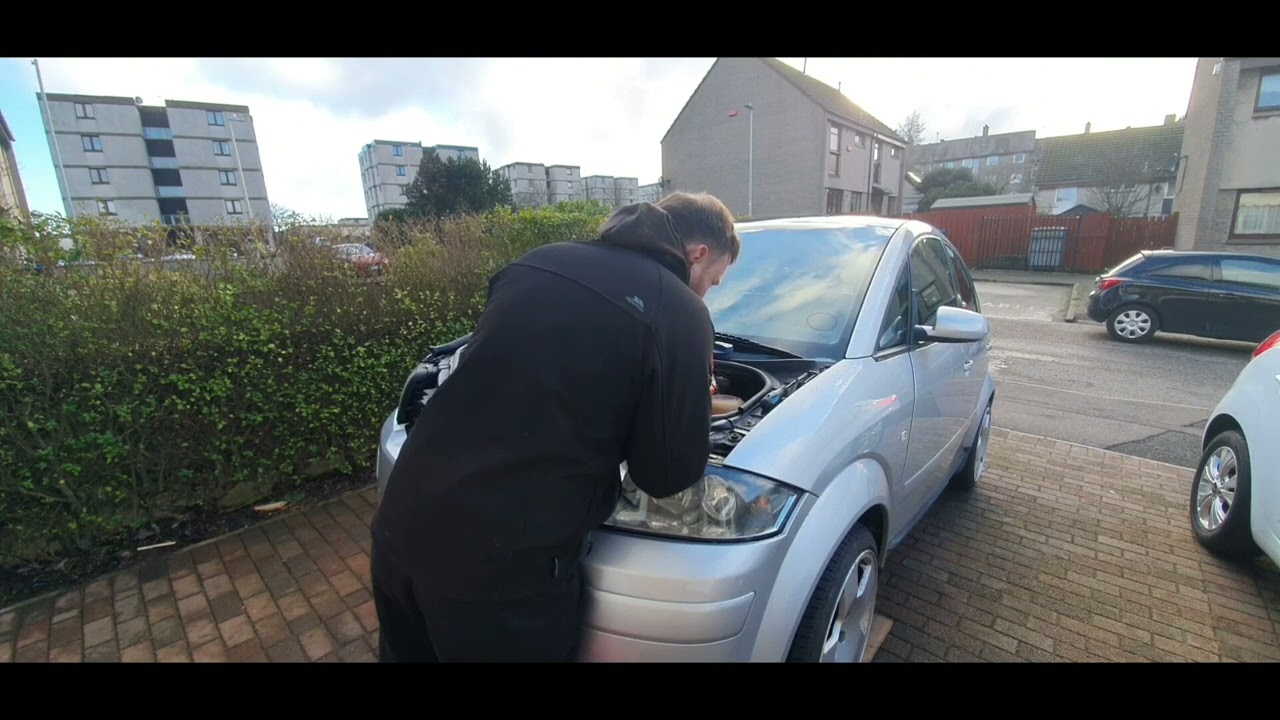 audi a2 wymiana całego uchwytu termostatu