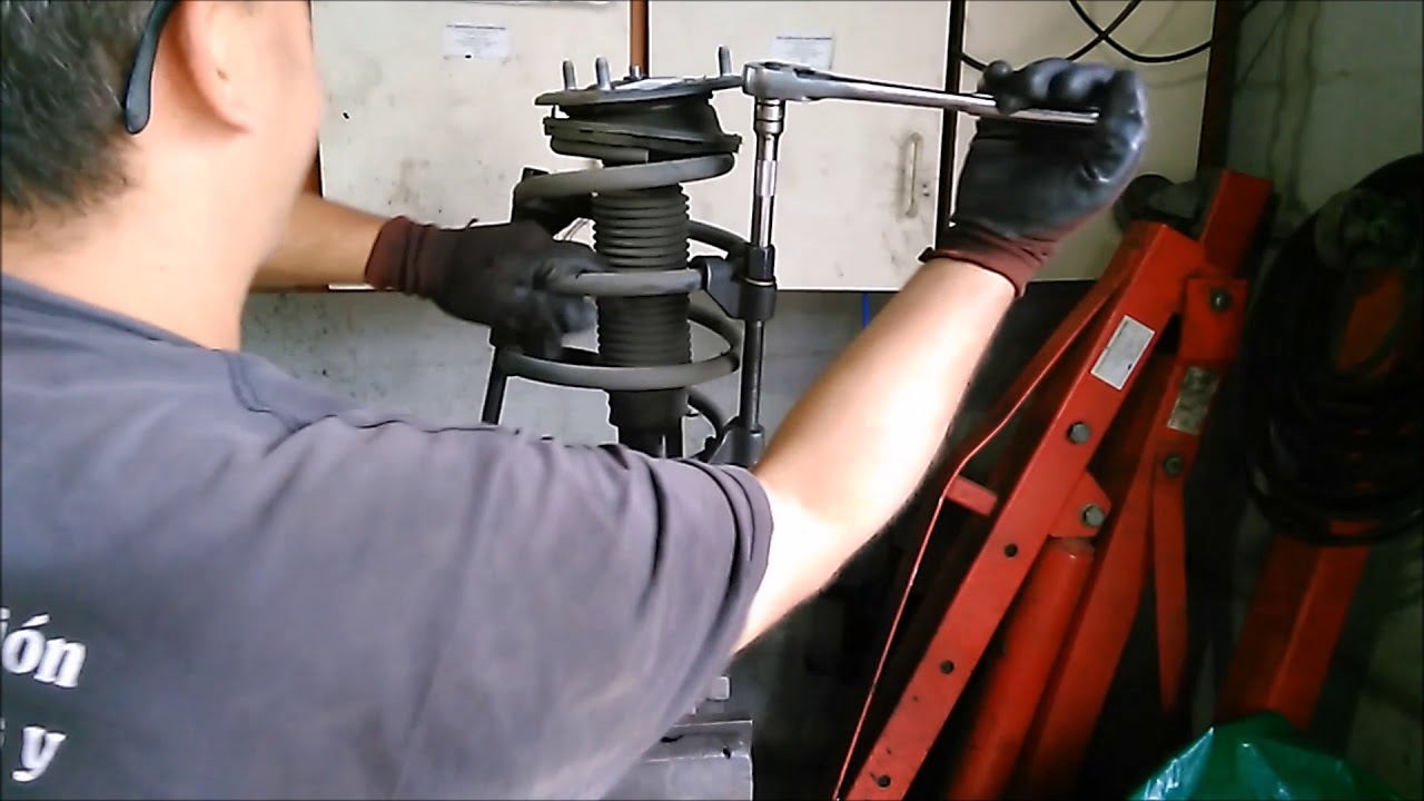 COMO SE CAMBIA EL AMORTIGUADOR DELANTERO DE UN HYUNDAI SANTA FE 2008