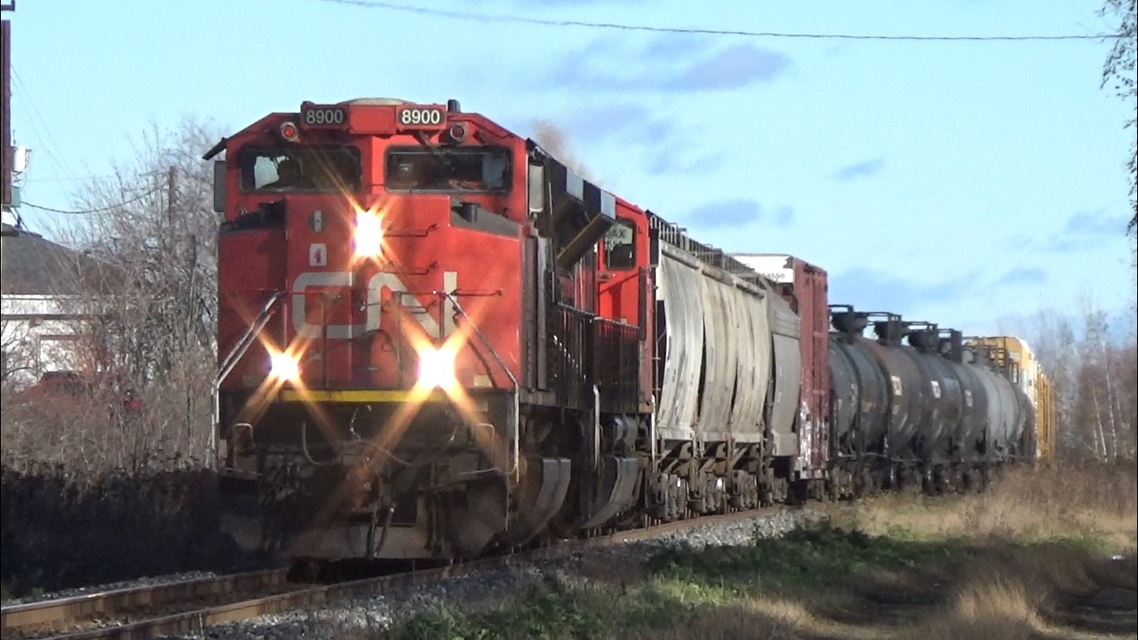 EMD M-2s Lead Freight Train CN 507 thru West End of Moncton, NB at Decent Speed