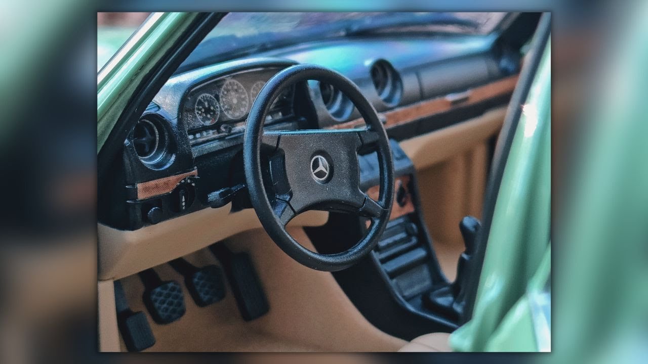 1982 Mercedes-Benz W123 (230E) by Norev in 1/18 scale | Showing details.