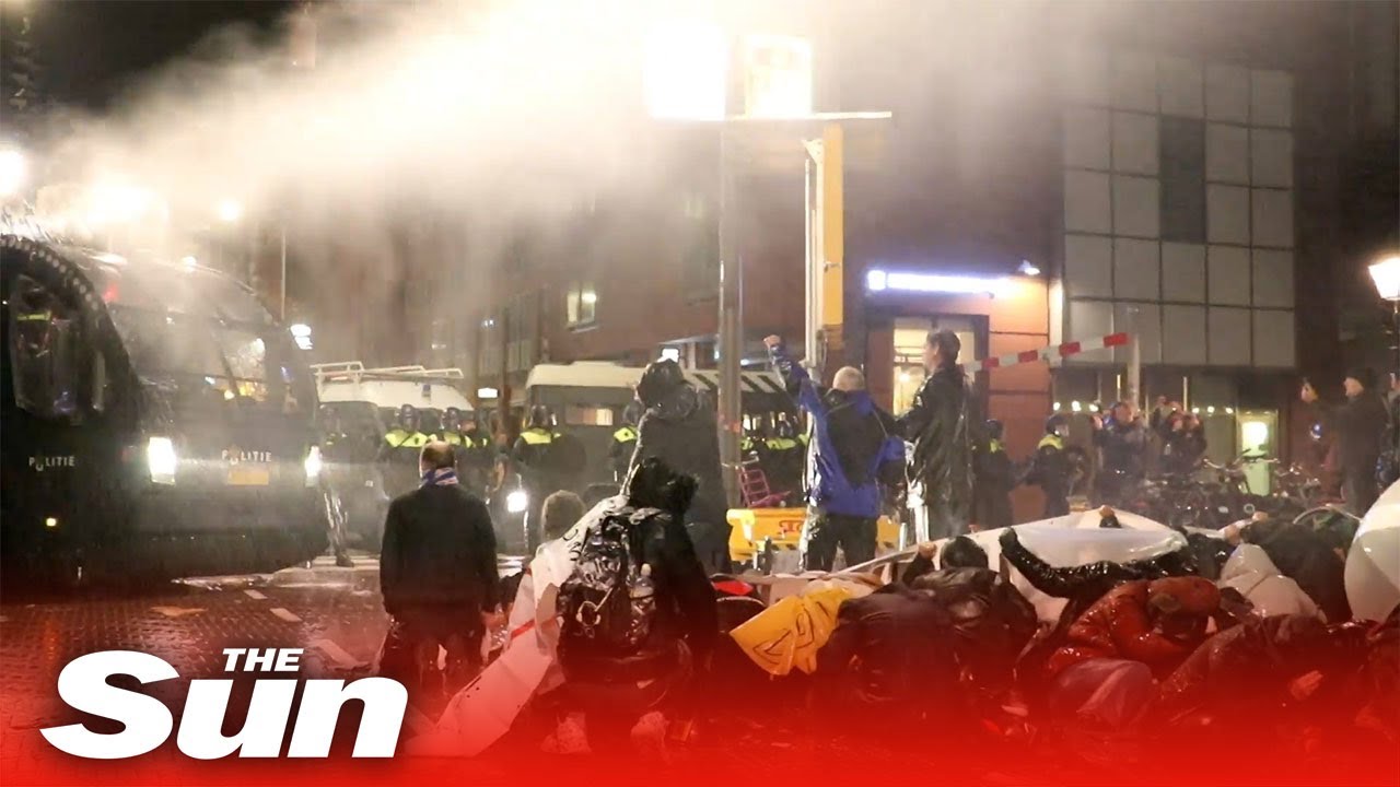 Dutch protesters blasted with water cannons by riot cops as lockdown returns