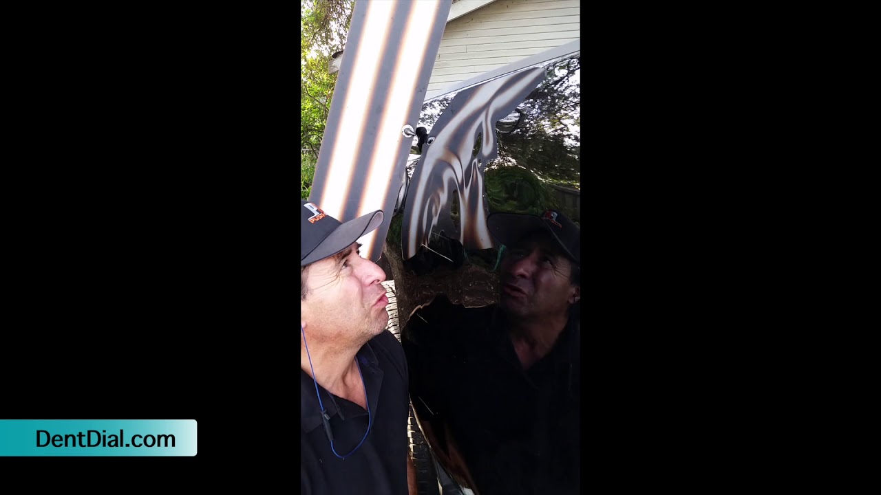 Chevy Silverado paintless dent repair on bedside.