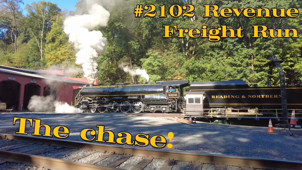 Chasing Reading & Northern's #2102 pulling a revenue freight train!