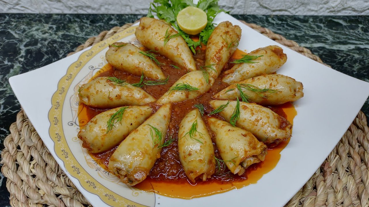 طريقة عمل كليماري محشي أرز ني فى ني مستوي فى الصلصة عصافير البحر أو الحبار  محشي بارجل وروس واجنحة 🐙