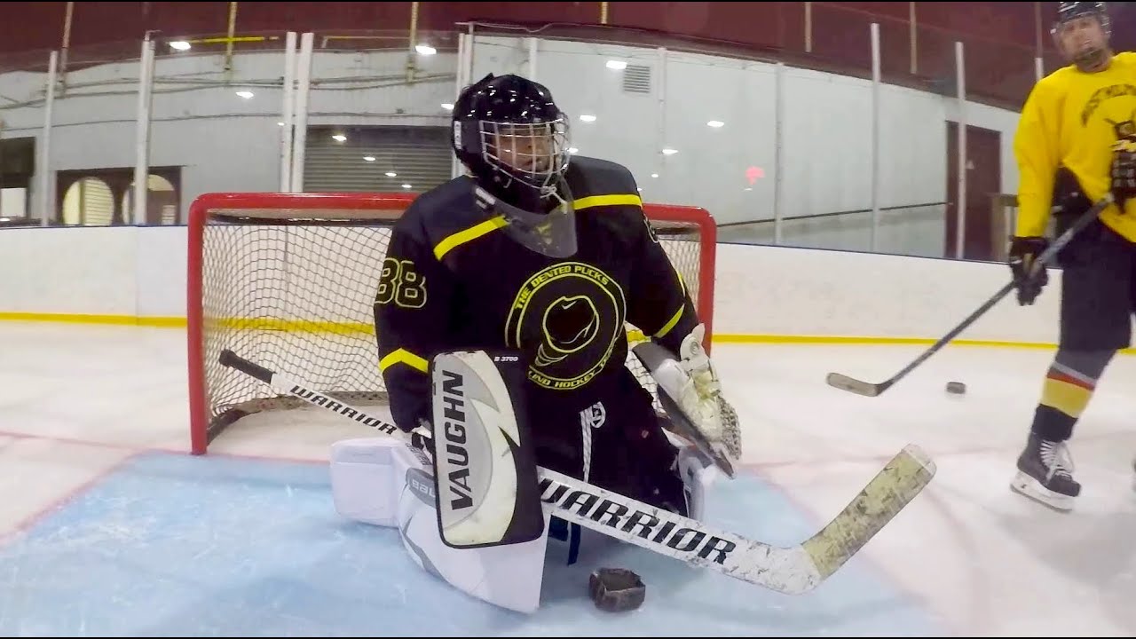 Blind Ice Hockey Goalie Enjoying New Equipment Donation