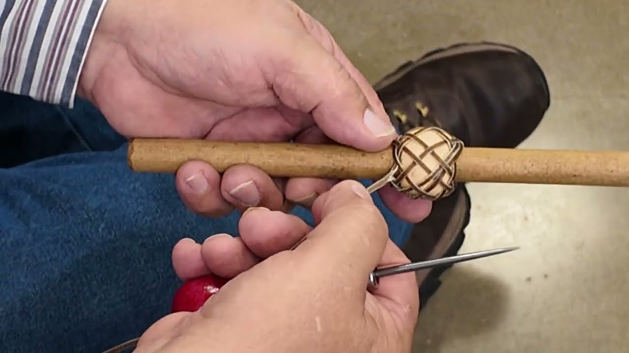 Mike Hickey explaining the difference between a herringbone and a pineapple interweave