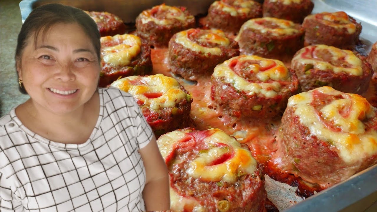 ROCAMBOLE DE CARNE JÁ ASSA CORTADO