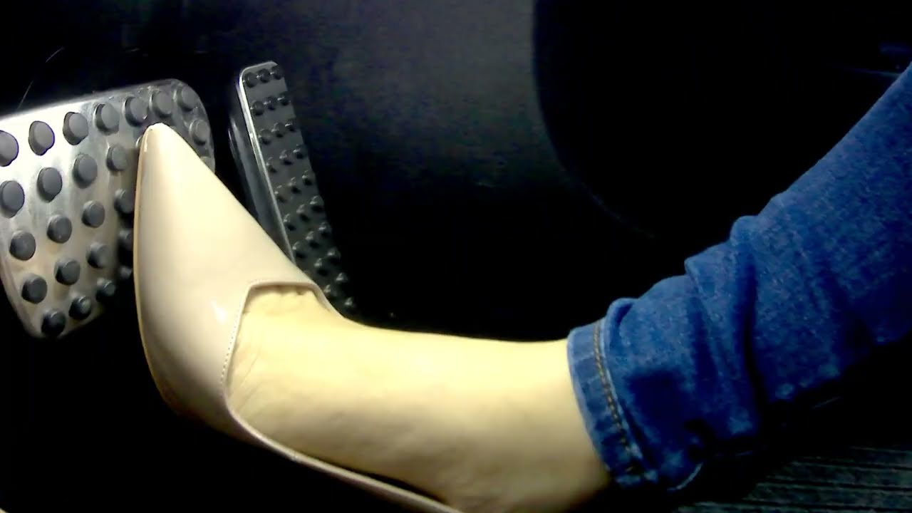 Girlfriend hard flooring the Mercedes in slingback Heels