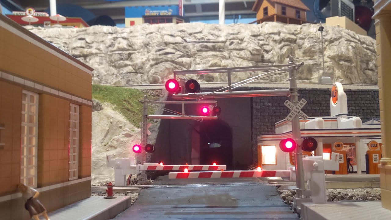 MTH Amtrak F40PHs with my scratch built railroad crossing gates