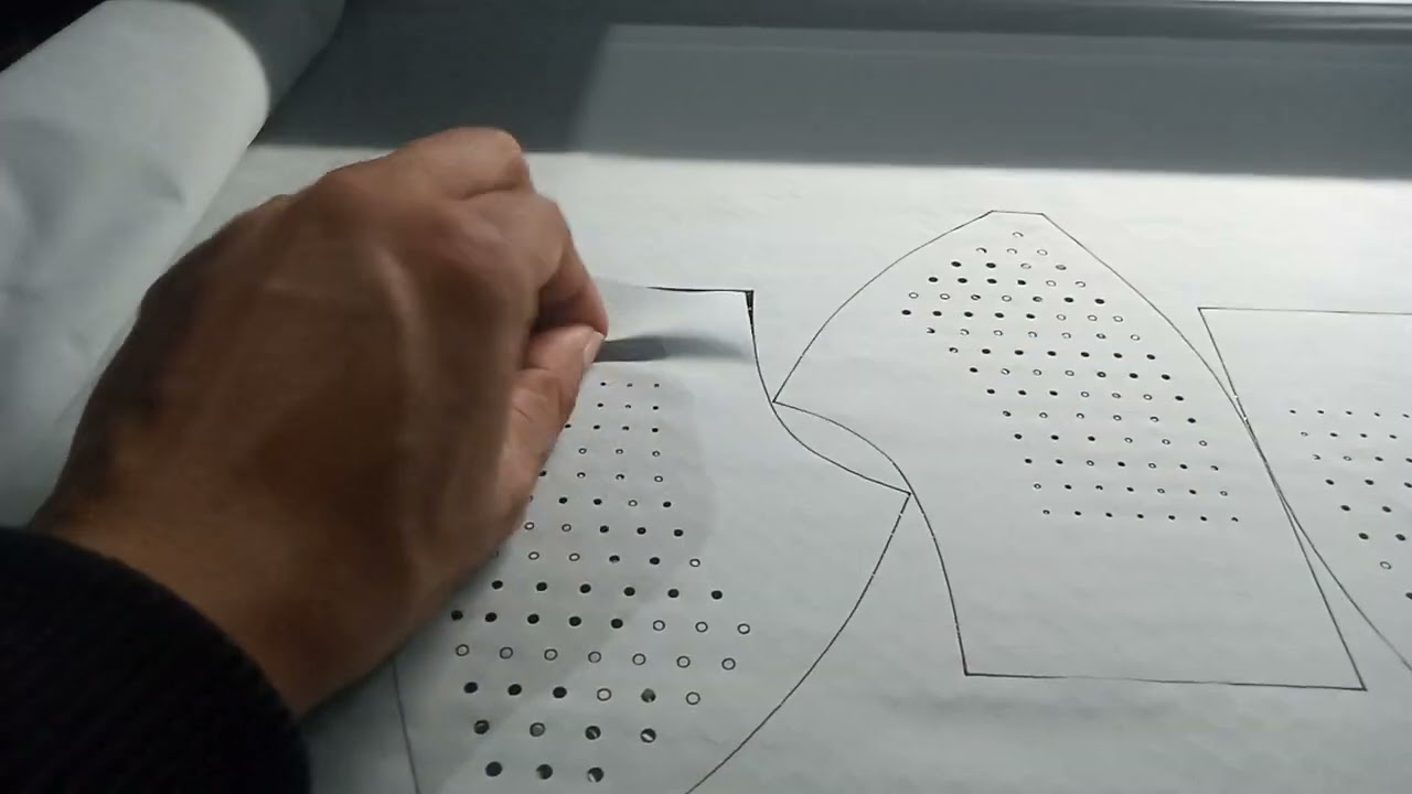 Laser Cutting Process Golf Caps on Grey Despo Stretch