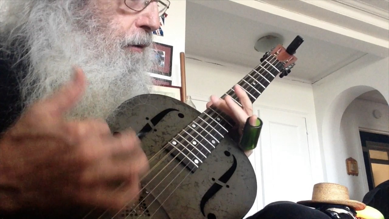 Guitar lesson in open d.
