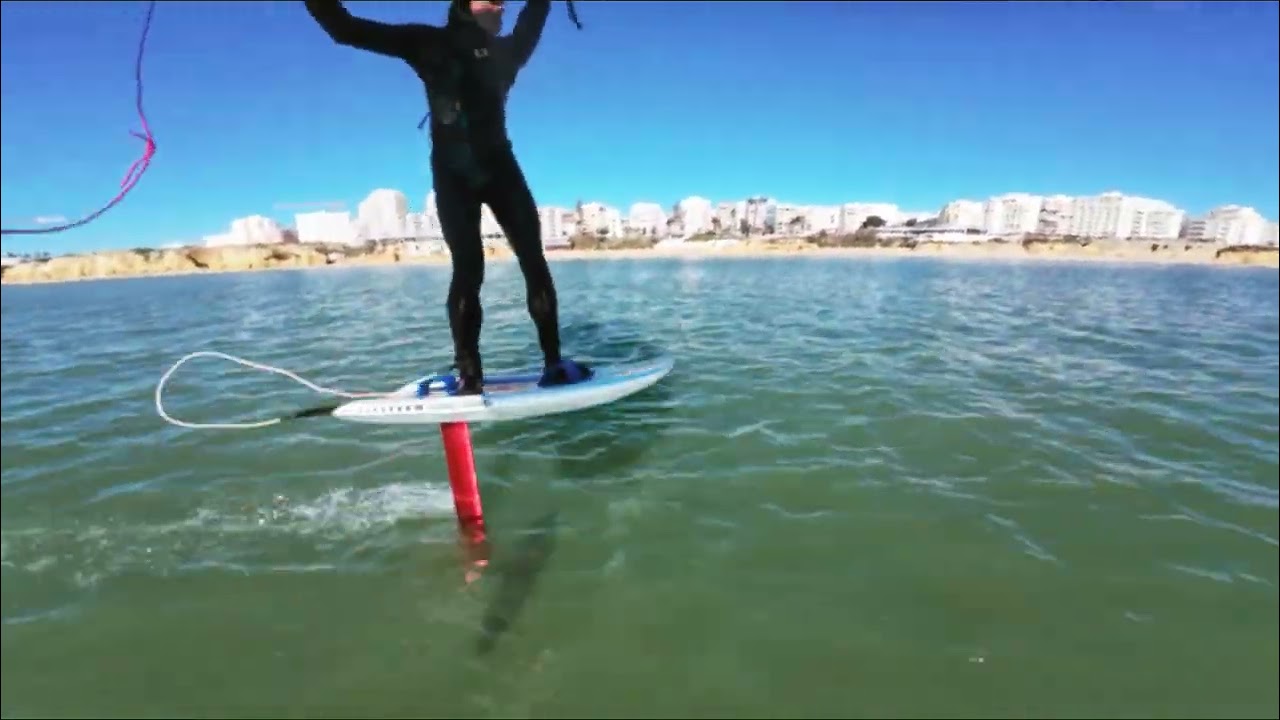 Wing foiling in the Algarve with off shore wind, filmed January 2026 in Armação de Pêra, Portugal 