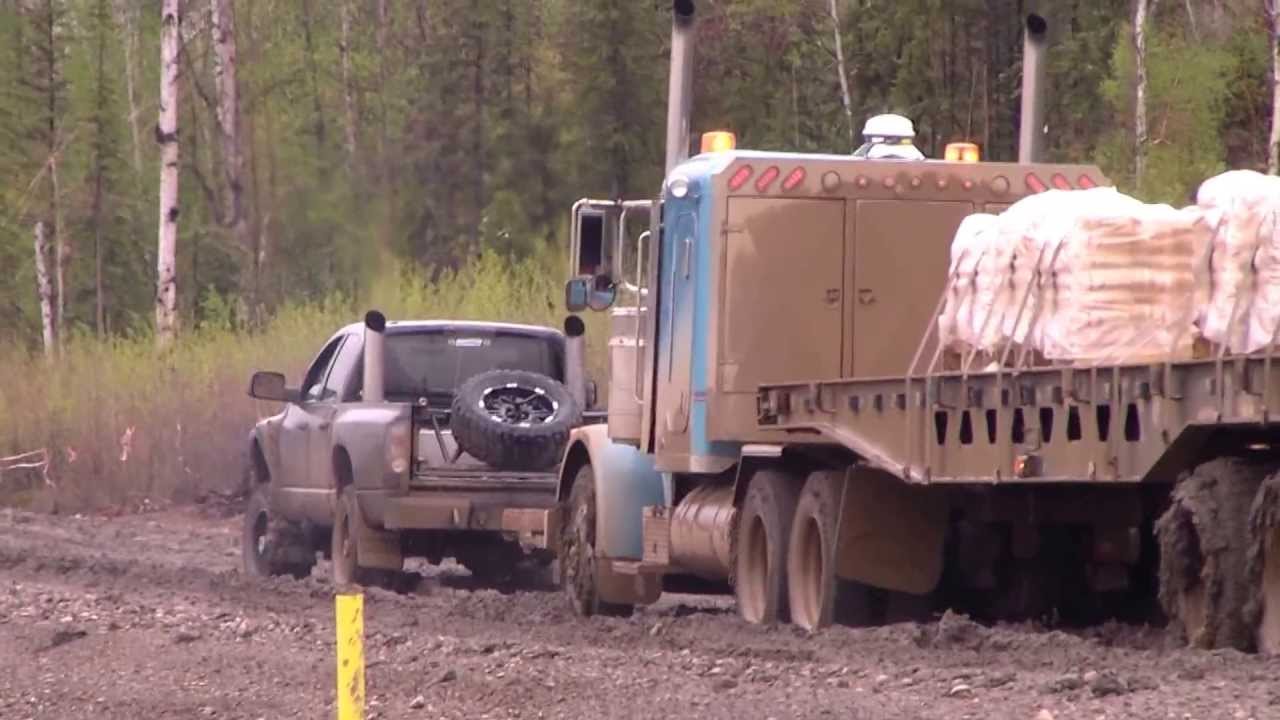Dodge Pickup Pulling Loaded Peterbuilt