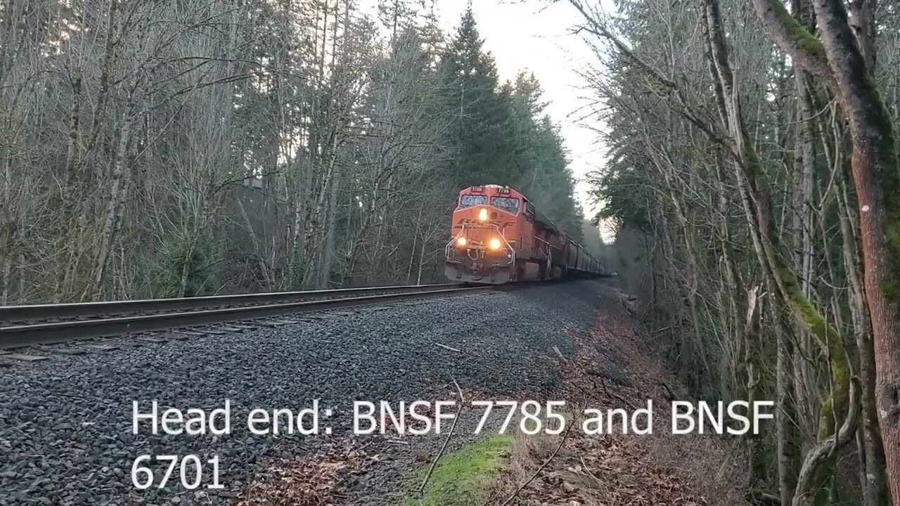 Two empty grain trains back-to-back with horn salutes on the Stampede Sub!