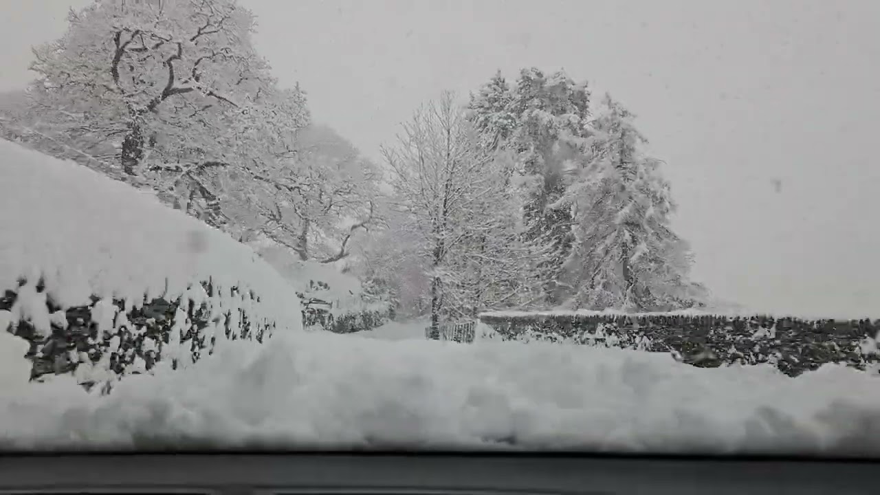 driving in the snow by Coniston water