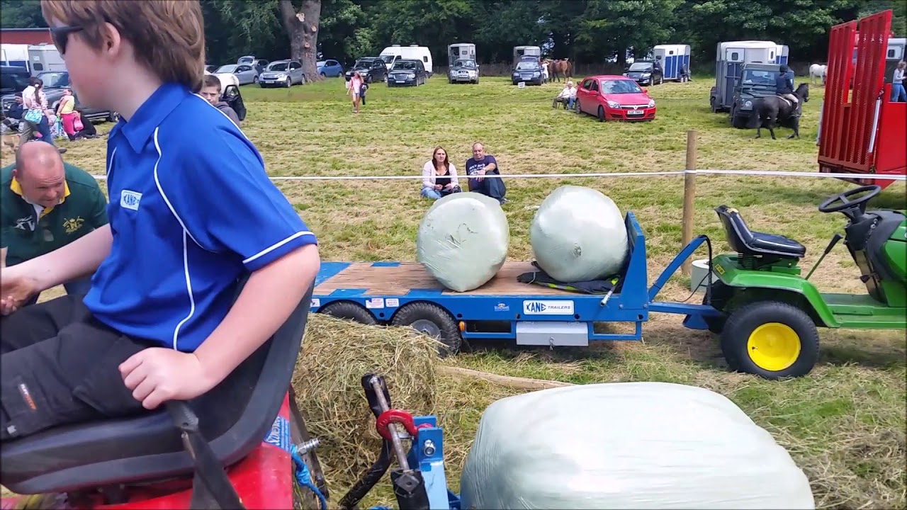 Grass lads at castlewellan show baling, wrapping and lifting no music this time