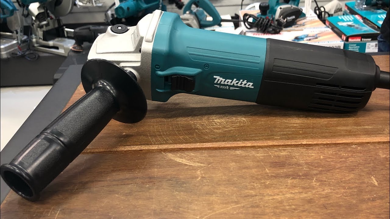 Esmirilhadeira angular m9511 850w 11000rpm Makita pega disco 125mm