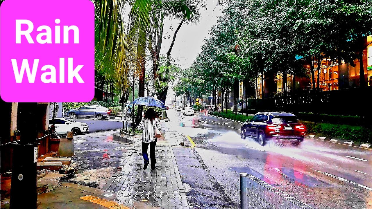Walking in the Rain (Vid-66) from KLCC to Jalan Ampang in Kuala Lumpur, Malaysia.