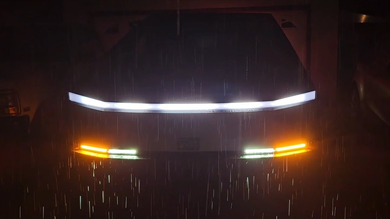 Tesla Cybertruck The Arrival Light Show At Night in the Rain Without Music View From the Front