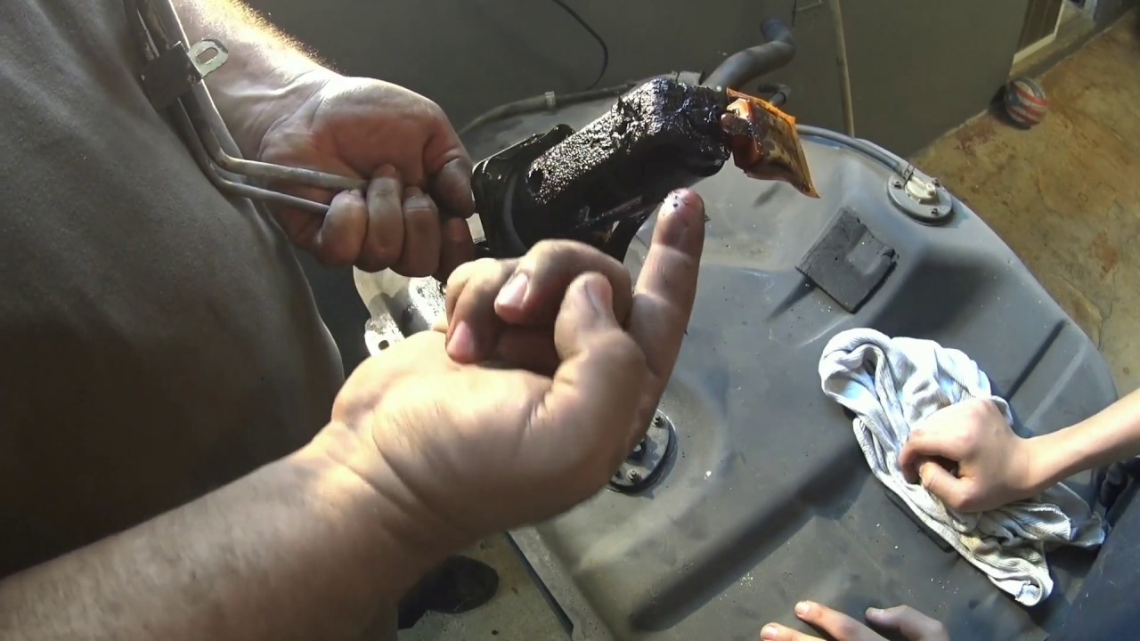 Como remover el tanque de combustible mirage 