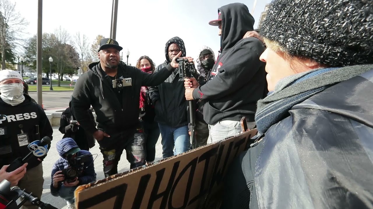 People confront supporter of Kyle Rittenhouse outside Kenosha courthouse
