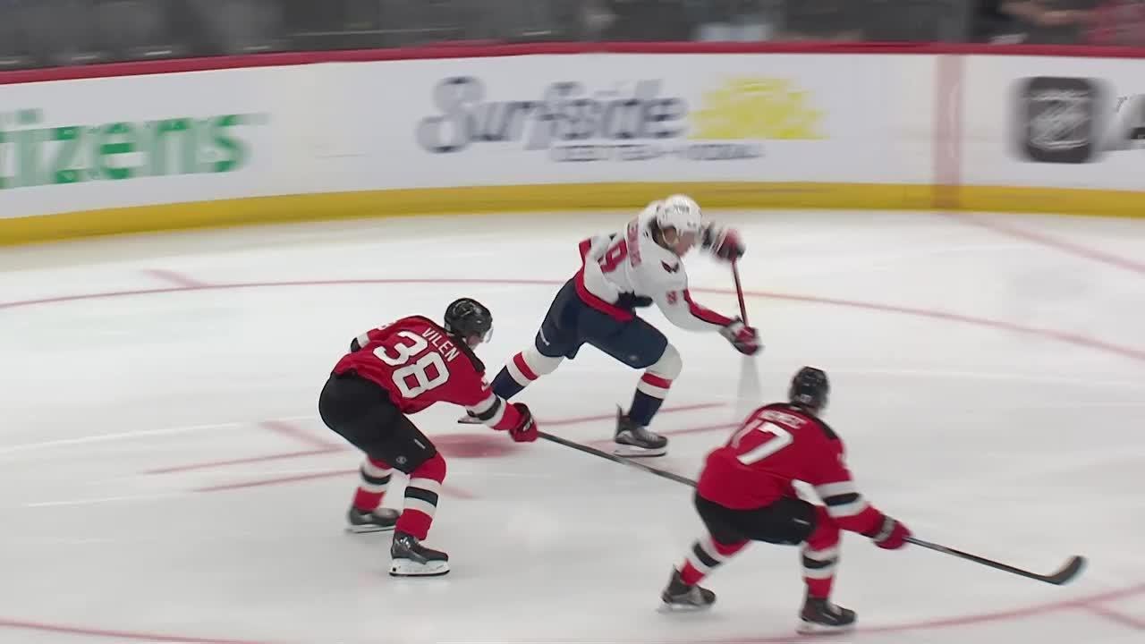 Ryan Leonard scores a goal against the New Jersey Devils