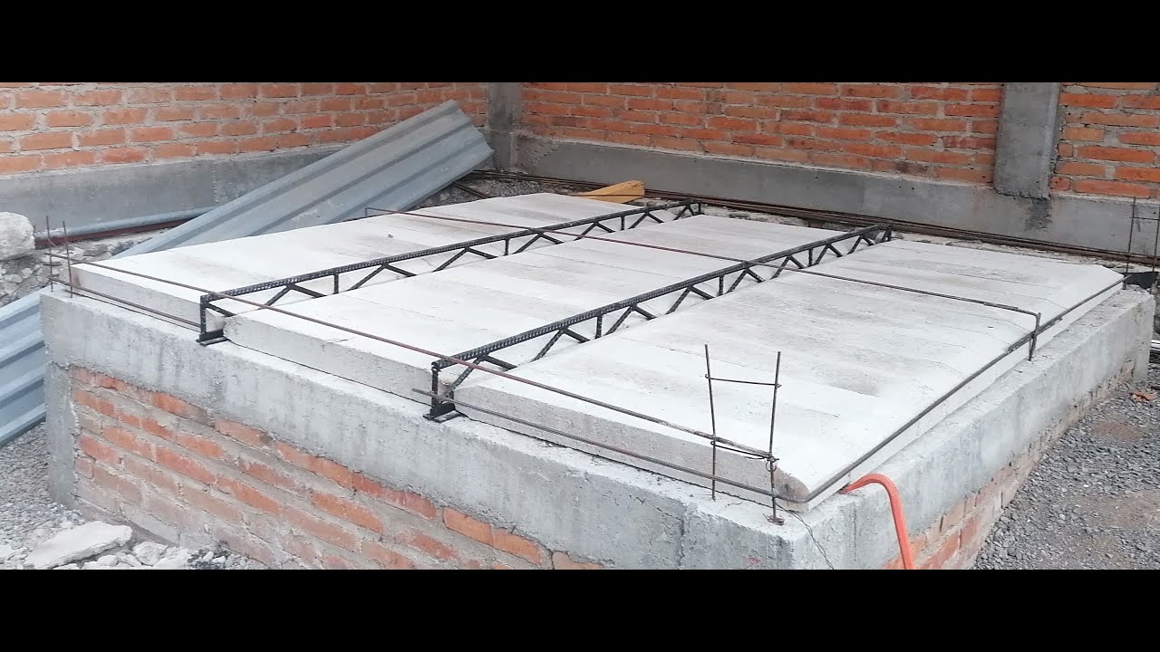 Cimbrado, colado perimetral y lechereada, para techar fosa con bovedilla y viguetas estructurales.