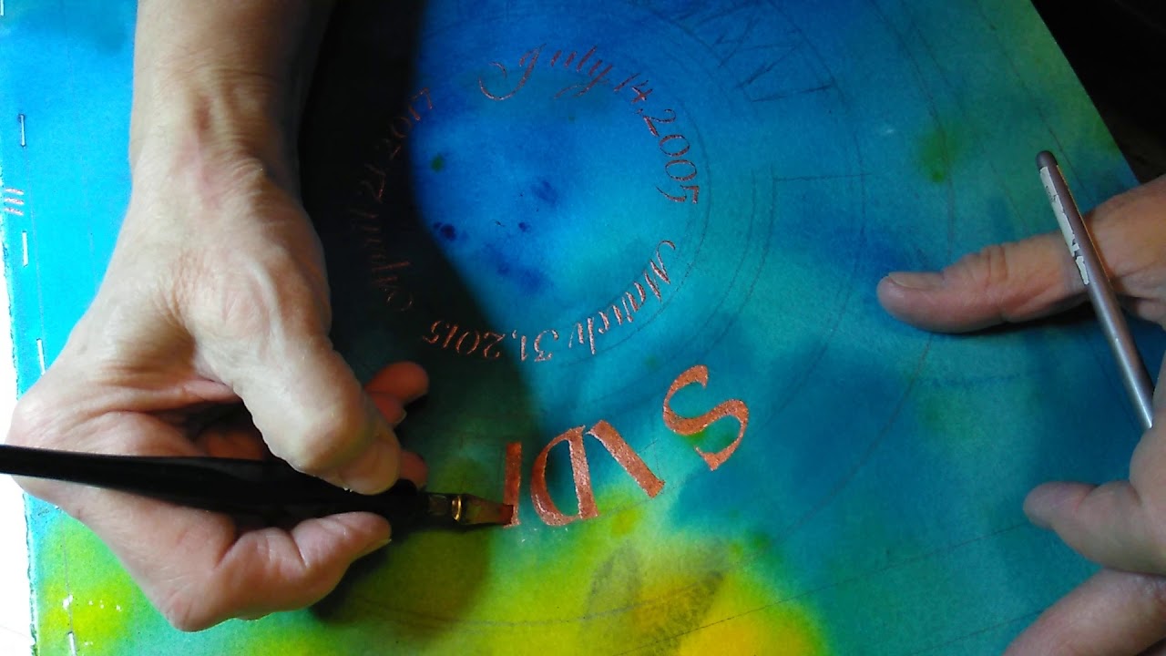 Metallic Ink on Watercolor Background in a Roundel