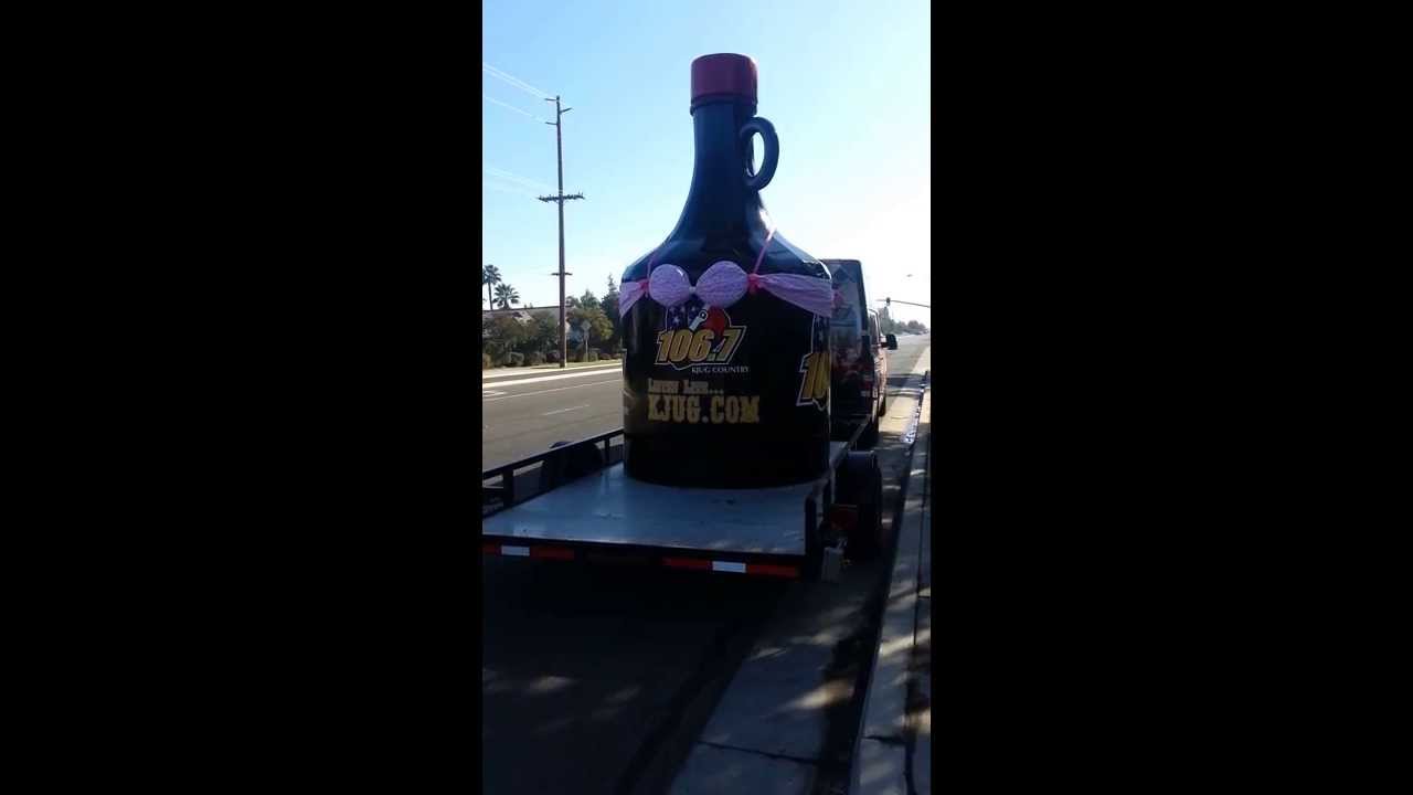 1067 KJUG COUNTRY 14FT JUG WEARS HUGE PINK BRA- BREAST CANCER AWARENESS
